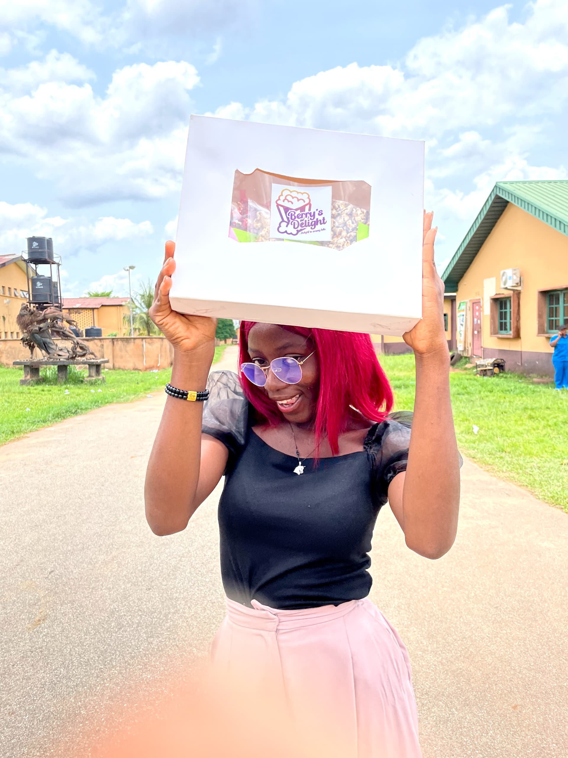 smiling lady with branded bag